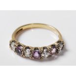 9CT GOLD AMETHYST AND WHITE STONE ETERNITY RING