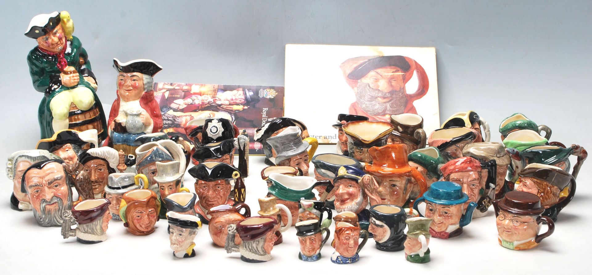 A LARGE COLLECTION OF ROYAL DOULTON MINATURE TOBY