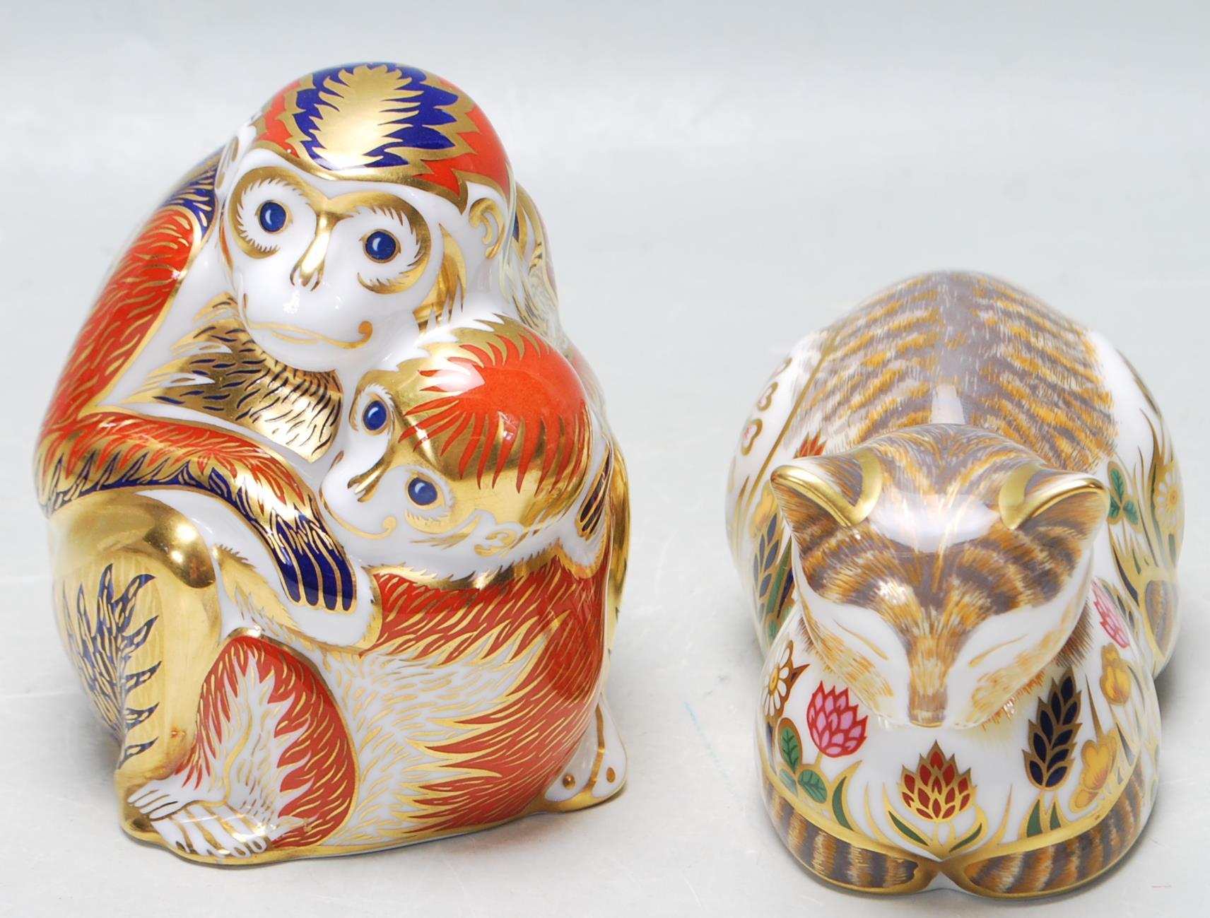 TWO ROYAL CROWN DERBY PAPERWEIGHTS