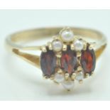 9CT GOLD MARQUISE CUT GARNET AND PEARL RING