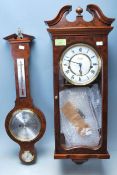 CLOCK AND BAROMETER BY COMITTI OF LONDON