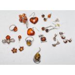 GROUP OF SILVER AND AMBER JEWELLERY