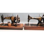 TWO EARLY 20TH CENTURY CASED SEWING MACHINES SINGER AND JONES
