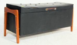 1970’S BLACK VINYL OTTOMAN STOOL WITH TEAK WOOD LEGS