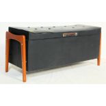 1970’S BLACK VINYL OTTOMAN STOOL WITH TEAK WOOD LEGS