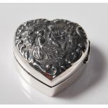 STERLING SILVER PILL BOX DECORATED WITH A COURTING COUPLE