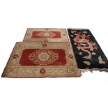 THREE 20TH CENTURY CHINESE ORIENTAL RUGS