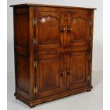 20TH CENTURY JACOBEAN REVIVAL CUPBOARD