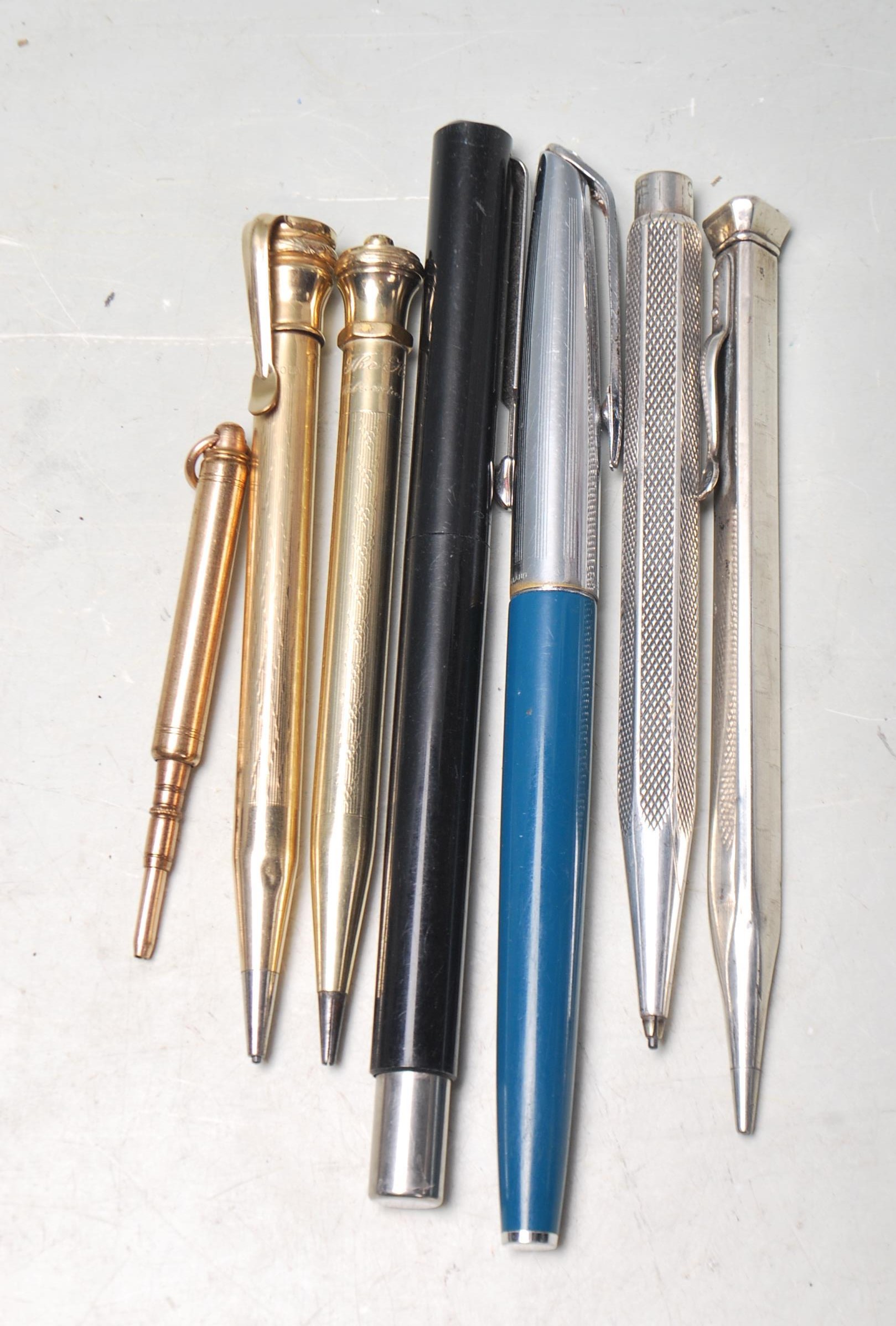 SEVEN VINTAGE WRITING PENS AND PENCILS