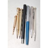 SEVEN VINTAGE WRITING PENS AND PENCILS