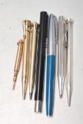 SEVEN VINTAGE WRITING PENS AND PENCILS