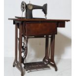 VINTAGE MID CENTURY GILT AND EBONISED SINGER SEWING MACHINE