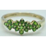 9CT GOLD AND GREEN STONES SET CLUSTER RING