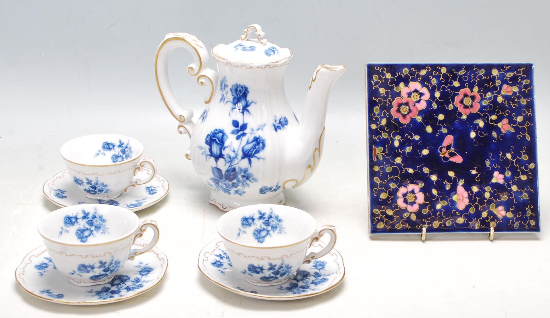 19TH CENTURY VICTORIAN ZSONLNAY BLUE CERAMIC TILE AND TEA SET