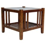 LATE 20TH CENTURY MAHOGANY AND GLASS COFFEE TABLE