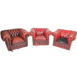 THREE 20TH CENTURY ANTIQUE STYLE OXBLOOD LEATHER CHESTERFIELD CHAIRS