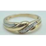 9CT GOLD AND DIAMOND LADIES CROSSOVER RING