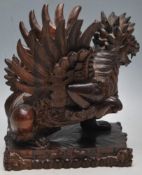 20TH CENTURY HAND CARVED HARDWOOD BALINESE WINGED LION