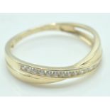 9CT GOLD AND WHITE STONE CROSSOVER HALF ETERNITY RING