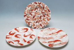 COLLECTION OF THREE EMMA BRIDGEWATER SHELLFISH PLATES.