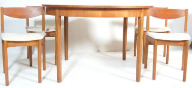 1970’S TEAK WOOD CIRCULAR EXTENDING DINING TABLE AND FOUR CHAIRS