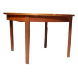 1970’S TEAK WOOD CIRCULAR EXTENDING DINING TABLE