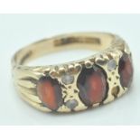 EDWARDIAN 9CT GOLD RING SET WITH RED AND WHITE STONES