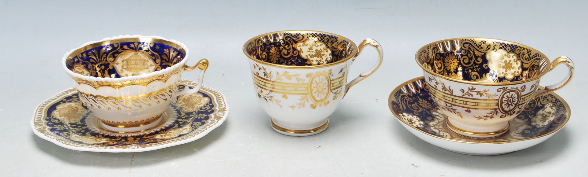 GROUP OF FIVE 19TH CENTURY VICTORIAN CABINET CUPS AND SAUCERS