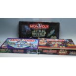 COLLECTION OF THREE CONTEMPORARY MONOPOLY BOARD GAMES