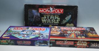 COLLECTION OF THREE CONTEMPORARY MONOPOLY BOARD GAMES