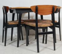 1950’S TEAK WOOD EXTENDING DINING TABLE AND CHAIRS