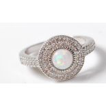 .925 SILVER LADIES DRESS RING WITH A CENTRAL OPALITE STONE.