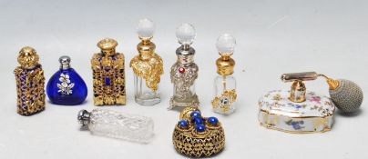 COLLECITON OF NINE VINTAGE PERFUME BOTTLES