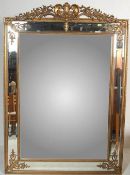 CONTEMPORARY GILT AND BEVELLED GLASS WALL MIRROR