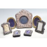 SEVEN 20TH CENTURY SILVER FRONTED PHOTO FRAMES