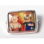 VINTAGE STYLE WHITE METAL BROOCH OF RECTANGULAR FORM WITH ROYAL CATS