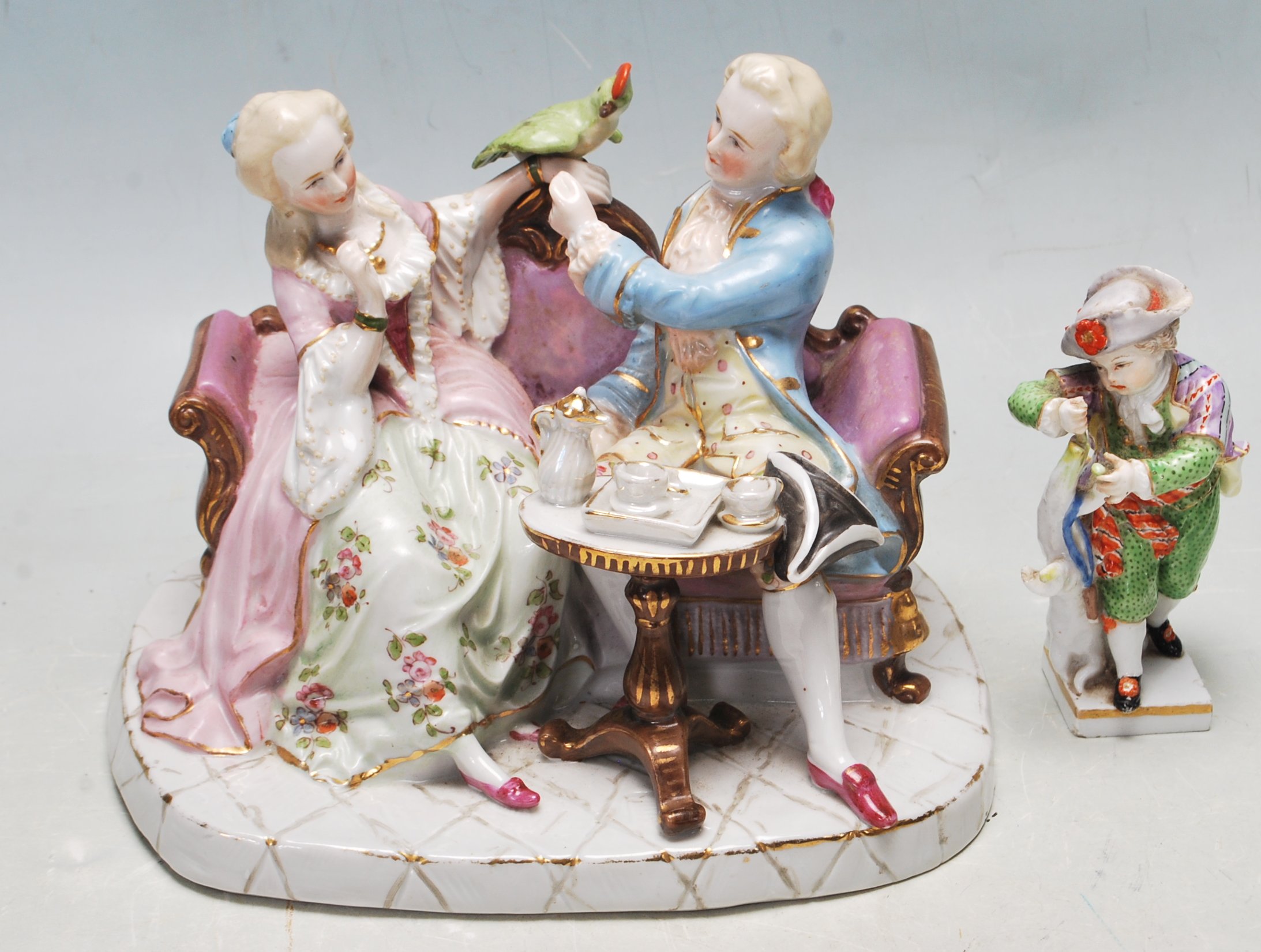 ANTIQUE 19TH CENTURY MEISSEN PORCELAIN FIGURINE TOGETHER WITH A GERMAN FIGURINE OF A COURTING COUPLE