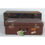 EARLY 20TH CENTURY MILITARY METAL SHIPPING TRUNK AND A BROWN LEATHER SUITCASE