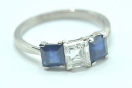 CONTEMPORARY DIAMOND AND SAPPHIRE THREE STONE RING