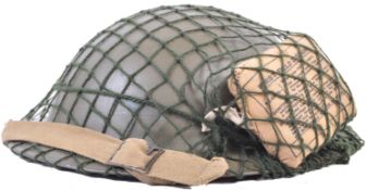 WWII SECOND WORLD WAR BRODIE HELMET WITH CAMOUFLAGE NET