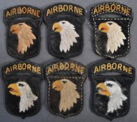 COLLECTION OF WWII RELATED 101ST AIRBORNE SCREAMING EAGLE PATCHES