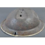 ORIGINAL WWII SECOND WORLD WAR BATTLE DAMAGED BRODIE HELMET