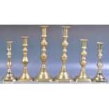 THREE PAIRS OF GEORGIAN ENGLISH TURNED BRASS CANDLESTICKS