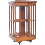 YEW AND MAHOGANY TWO TIER REVOLVING BOOKCASE