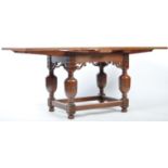 ARTS AND CRAFTS OAK DRAW LEAF DINING TABLE RAISED ON CUP & COVER SUPPORTS