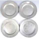 FOUR 18TH CENTURY GEORGIAN PEWTER CHARGER PLATES