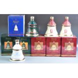 COLLECTION OF BELLS WHISKY CHRISTMAS DECANTERS