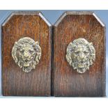 PAIR OF 19TH CENTURY OAK ARTS AND CRAFTS LION FACE BOOKENDS