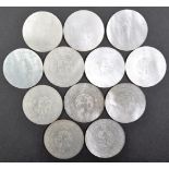 TWELVE 19TH CENTURY CHINESE MOTHER OF PEARL GAMING TOKENS