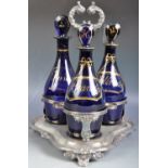 SET OF GEORGIAN BRISTOL BLUE DECANTER BOTTLES IN STAND